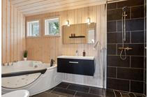 Badeværelse med spa og sauna